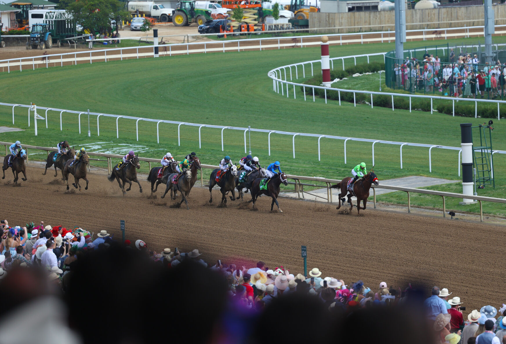 Horses run down final stretch from 300 section.JPG